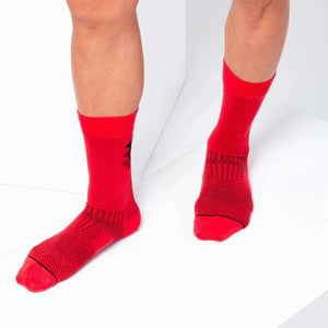 Man wearing red and black bamboo crew socks