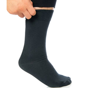 Man adjusting luxe dark grey crew sock, seamless toe, organic bamboo, by Uniq Socks Australia