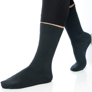 Luxurious dark grey organic bamboo crew socks by Uniq Socks Australia, worn on feet