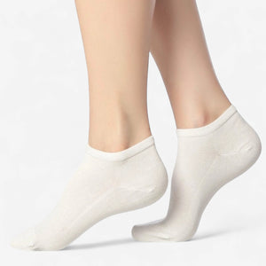 person wearing ivory, bamboo sneaker socks
