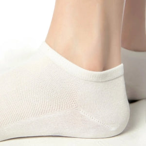 person wearing ivory, bamboo sneaker socks