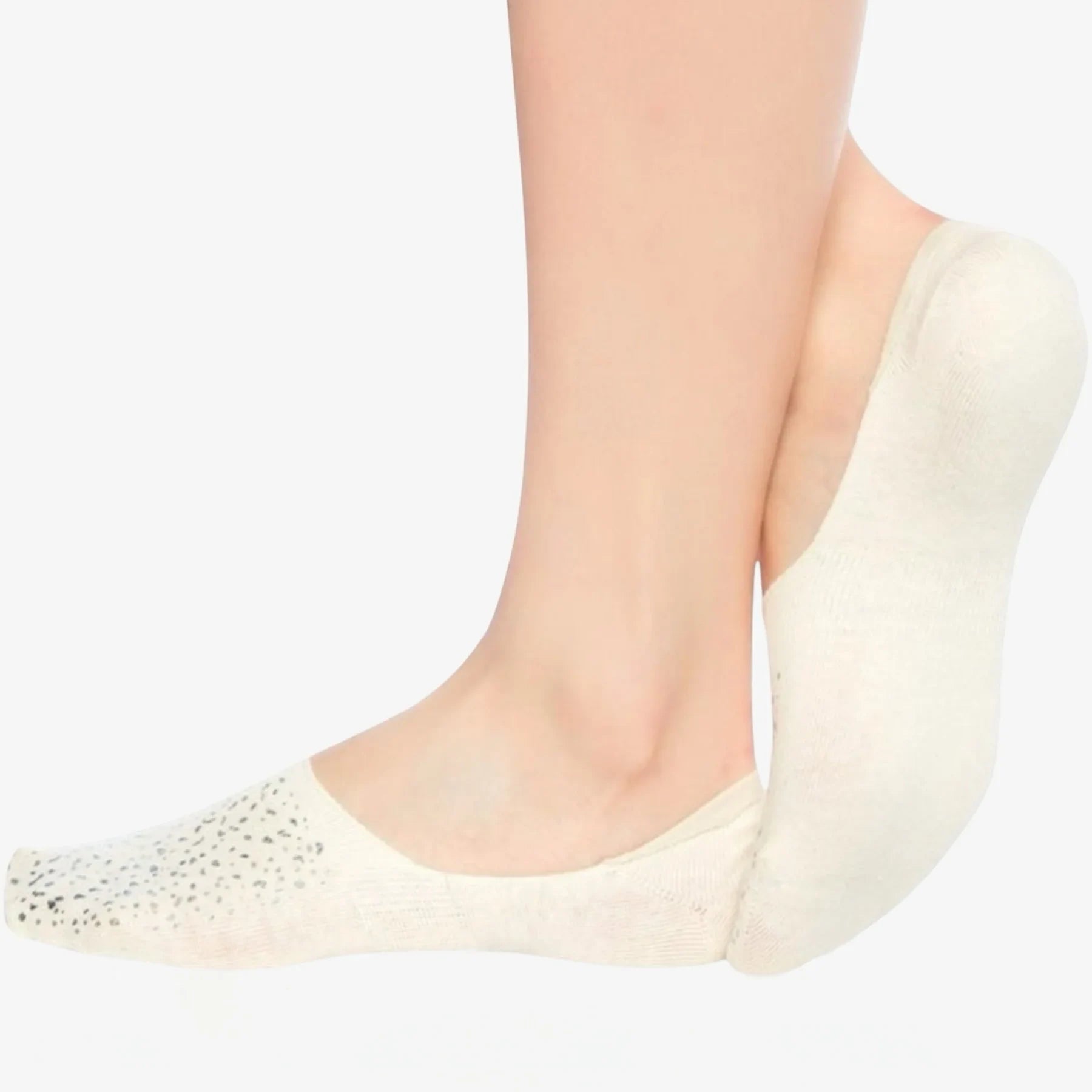 Person wearing ivory coloured no-show, anti-slip socks with sparkly details