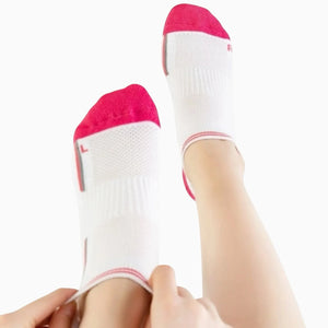 Person wearing CoolMax® white and pink sneaker socks