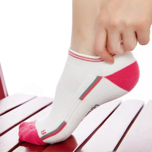Person wearing CoolMax® white and pink sneaker socks