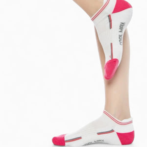Person wearing CoolMax® white and pink sneaker socks