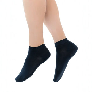 Black bamboo ankle socks worn on model showing comfortable low-cut fit