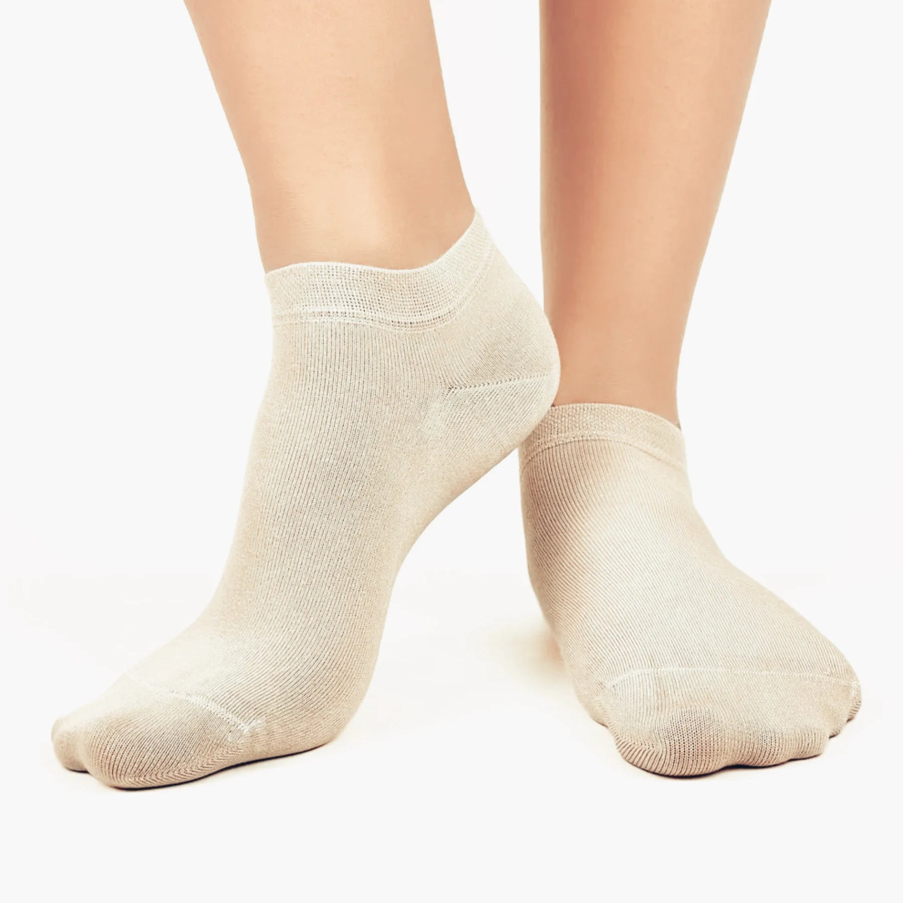 Image of person wearing beige bamboo ankle socks