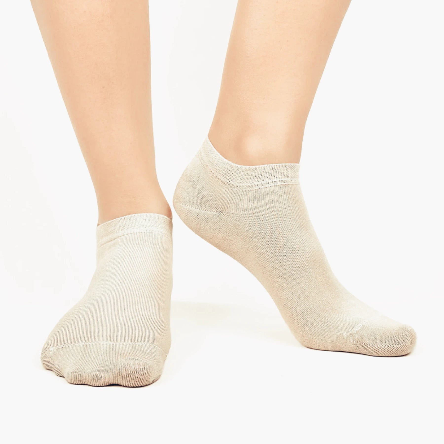 Image of person wearing beige bamboo ankle socks