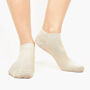 Image of person wearing beige bamboo ankle socks