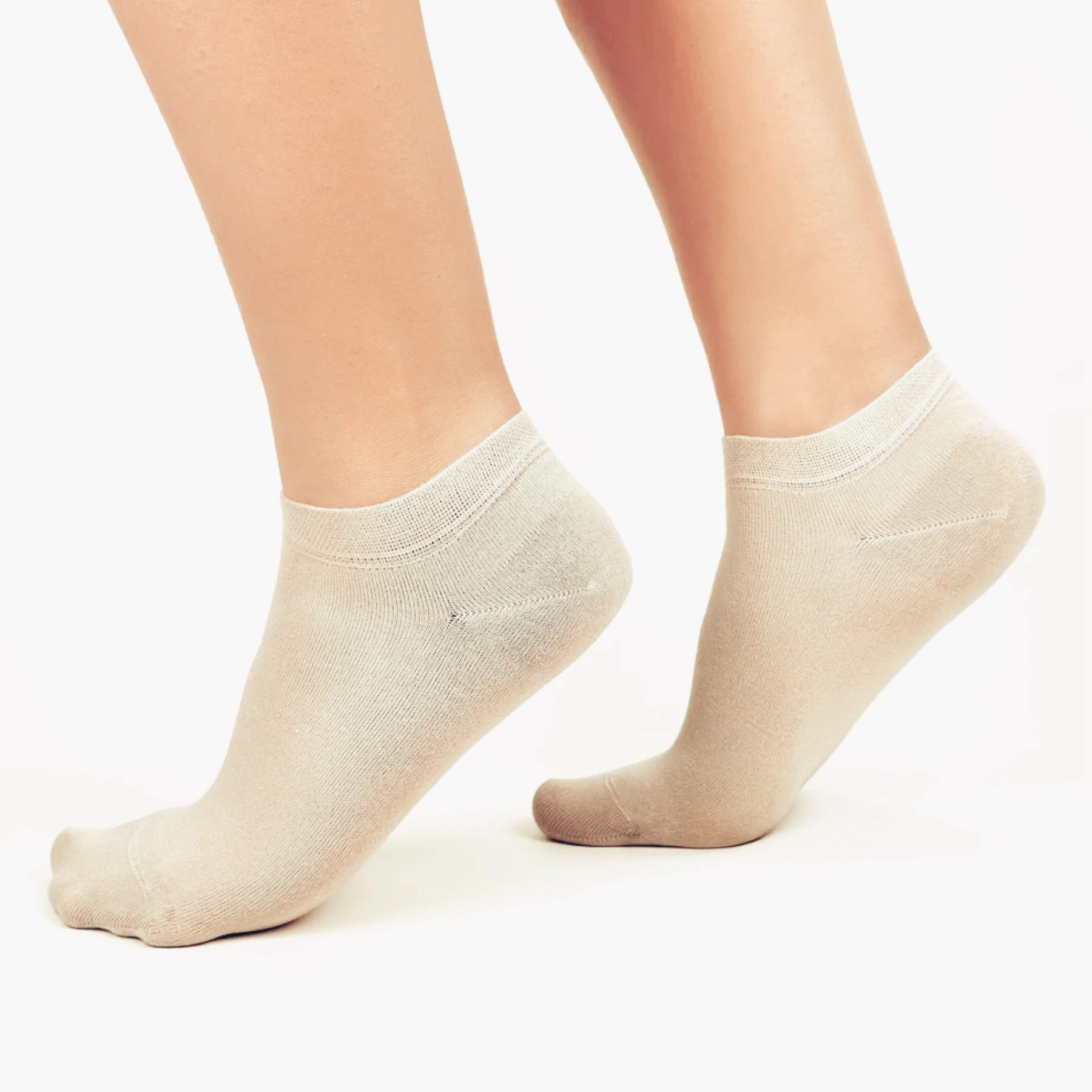 Image of person wearing beige bamboo ankle socks