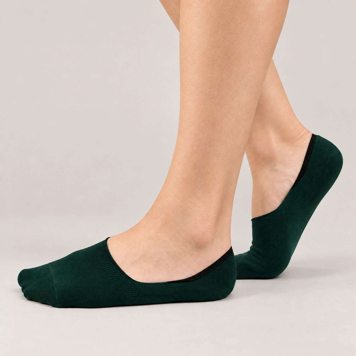 Forest green bamboo no-show socks worn on feet showing invisible low-cut fit