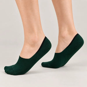 Forest green bamboo no-show socks worn on feet showing invisible low-cut fit