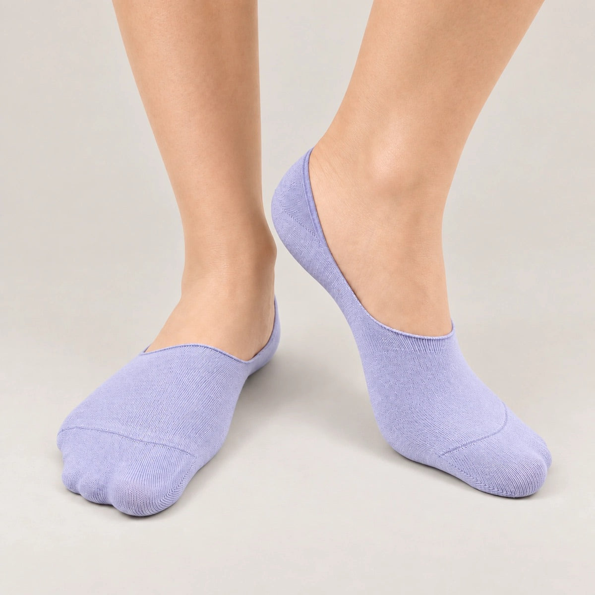 Person wearing lavender bamboo no-show socks