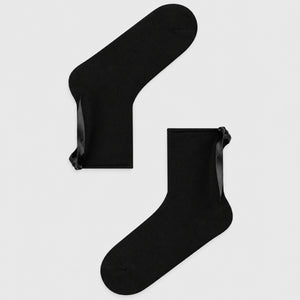Black quarter length socks with delicate bow accent