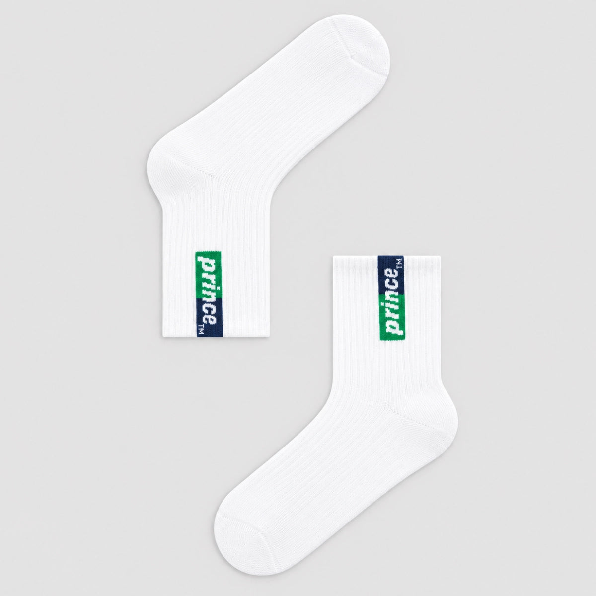white tennis socks with blue and green Prince label