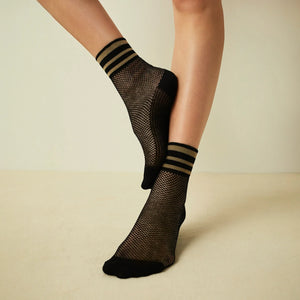 Black and beige open-weave socks