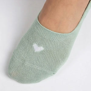 Mint no-show sock with a cream heart design on a light grey background