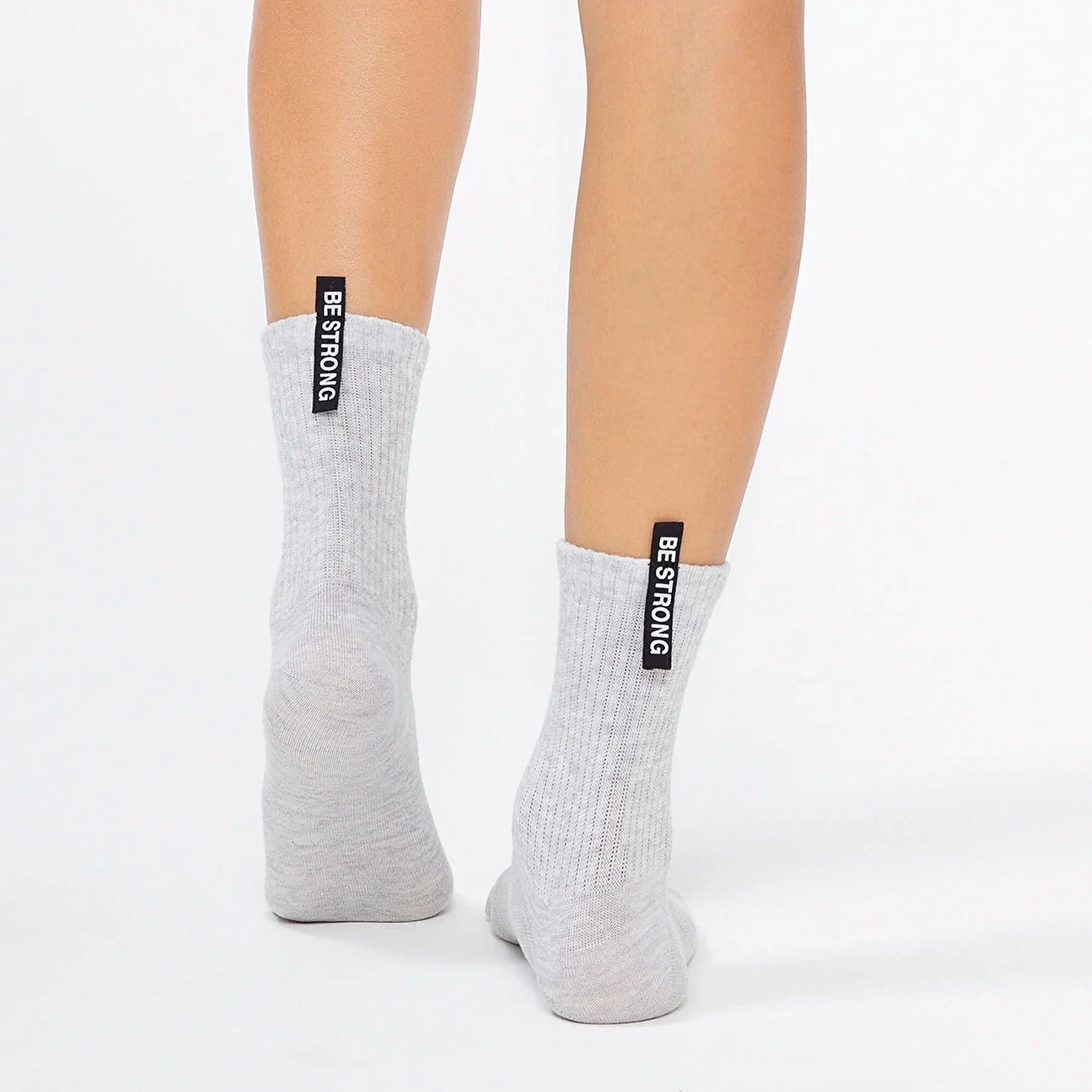 Grey ribbed socks with BE STRONG label, premium comfort by Uniq Socks Australia