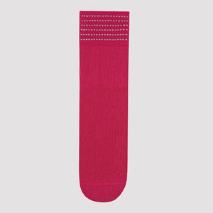 Product shot of bright pink quarter length sock cuffed with six rows of shiny dots