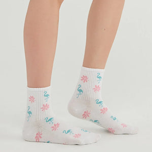 Woman wearing white quarter length socks with cute flamingoes