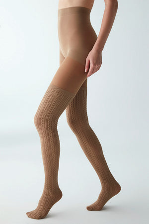 Side view of woman wearing beige fashion tights with a vertical cable pattern and thigh-high sock effect