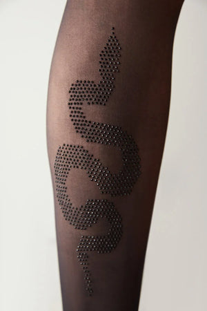 Black rhinestone-studded snake design tights on a plain background
