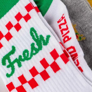 close-up photo showing detail of pizza-themed crew socks