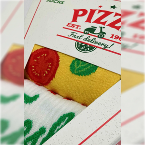 close-up photo showing detail of pizza-shaped gift box