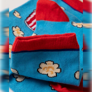 photo of light blue popcorn-themed crew socks