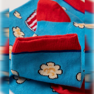 photo of light blue popcorn-themed crew socks
