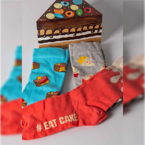 photo of 3 pairs of assorted cake-themed crew socks with gift box