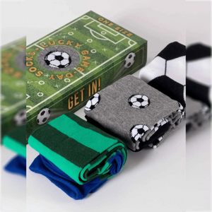 photo of 3 pair of assorted soccer-themed crew socks with soccer field-shaped gift box