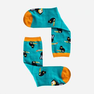 photo of turquoise crew socks with toucan images