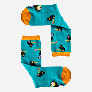 photo of turquoise crew socks with toucan images