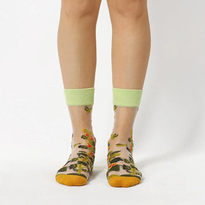 image of sheer socks with plant detail