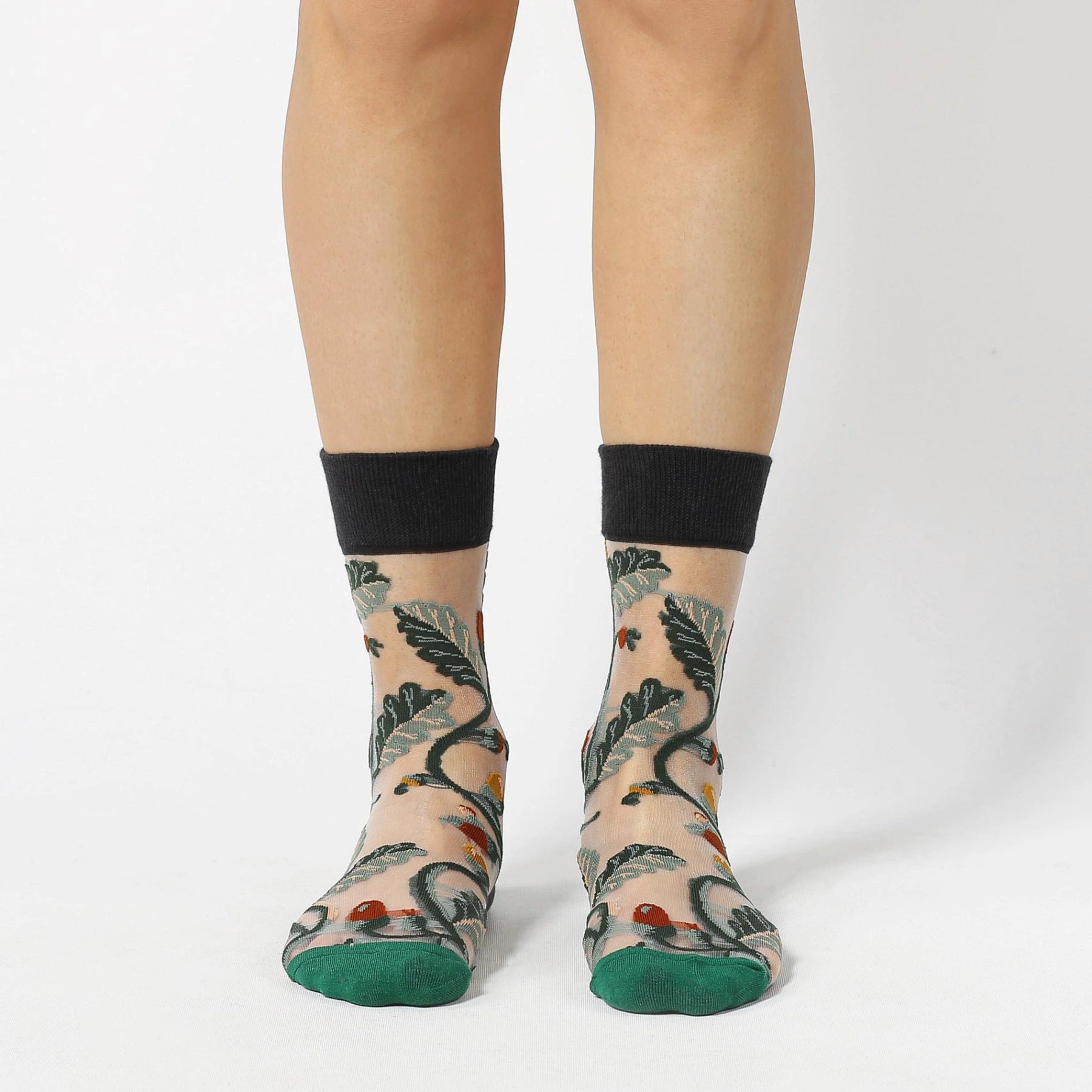image of sheer socks with plant detail