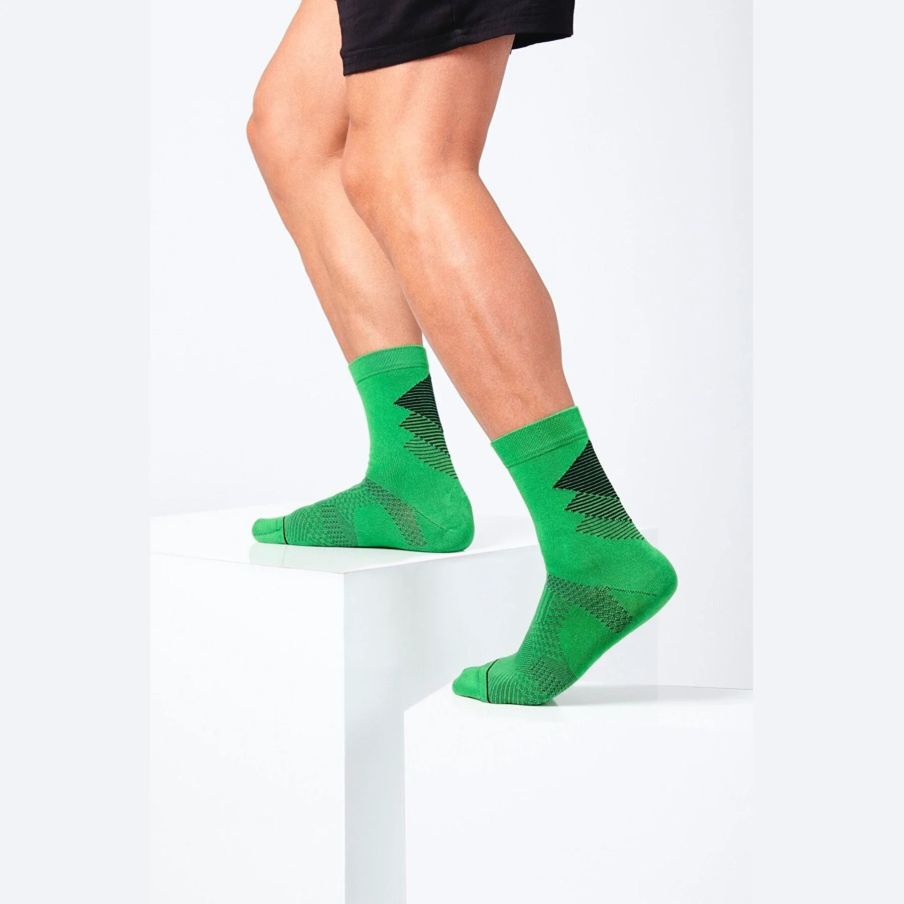Man wearing green bamboo socks