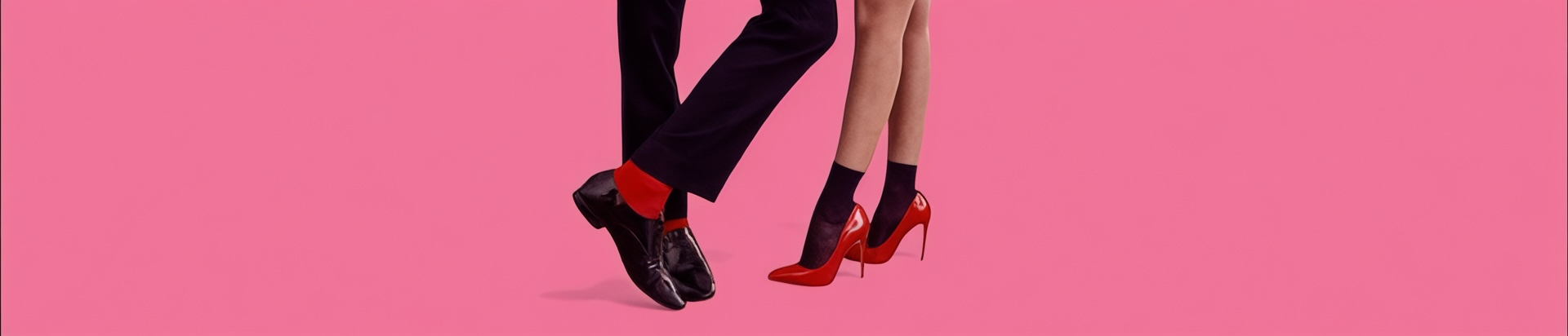 image of a man and woman in dress socks against a pink background