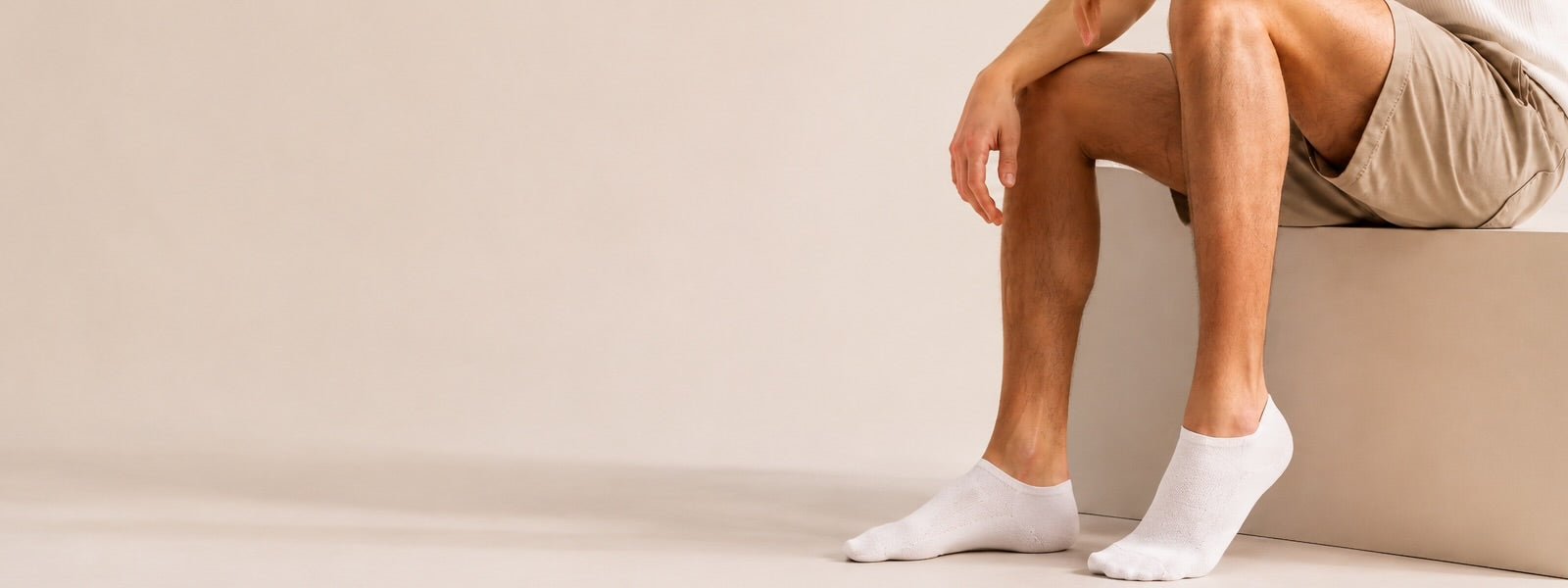 Luxury men’s white no-show socks with breathable everyday comfort and minimalist style by Uniq Socks.