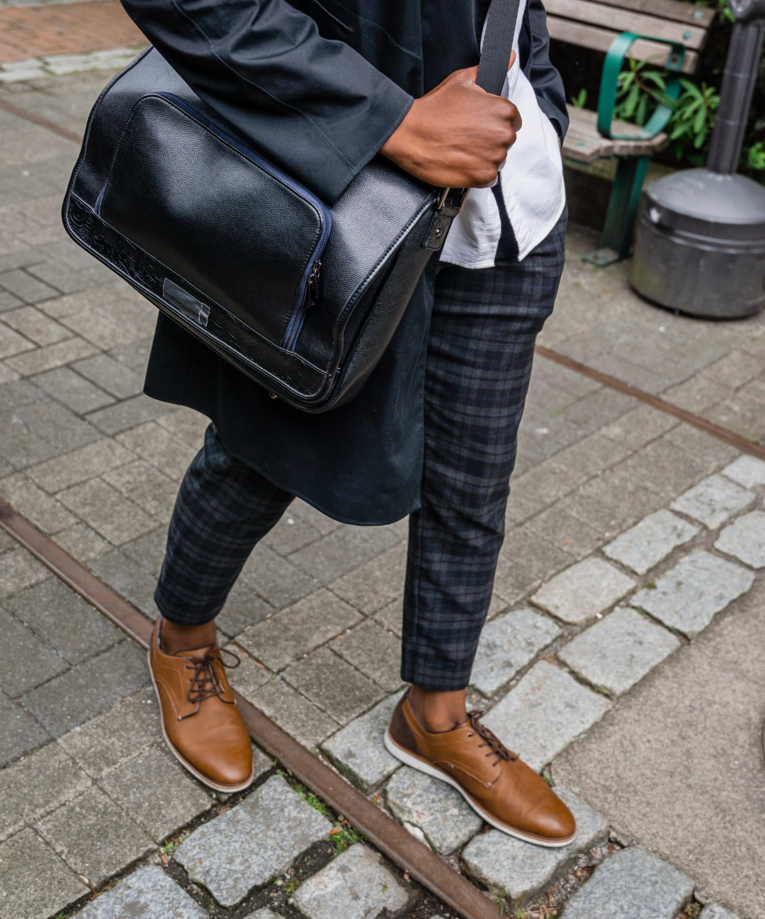 image of well dressed business man walking on the street