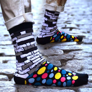 image of bricks and dot patterned colourful socks