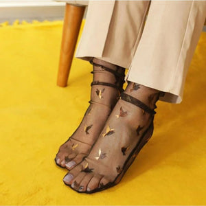 Black tule socks with gold birds