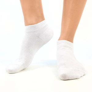 Close image of person wearing white bamboo ankle socks