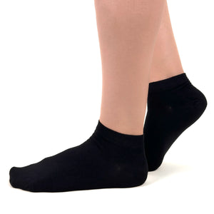 Close image of person wearing black bamboo ankle socks