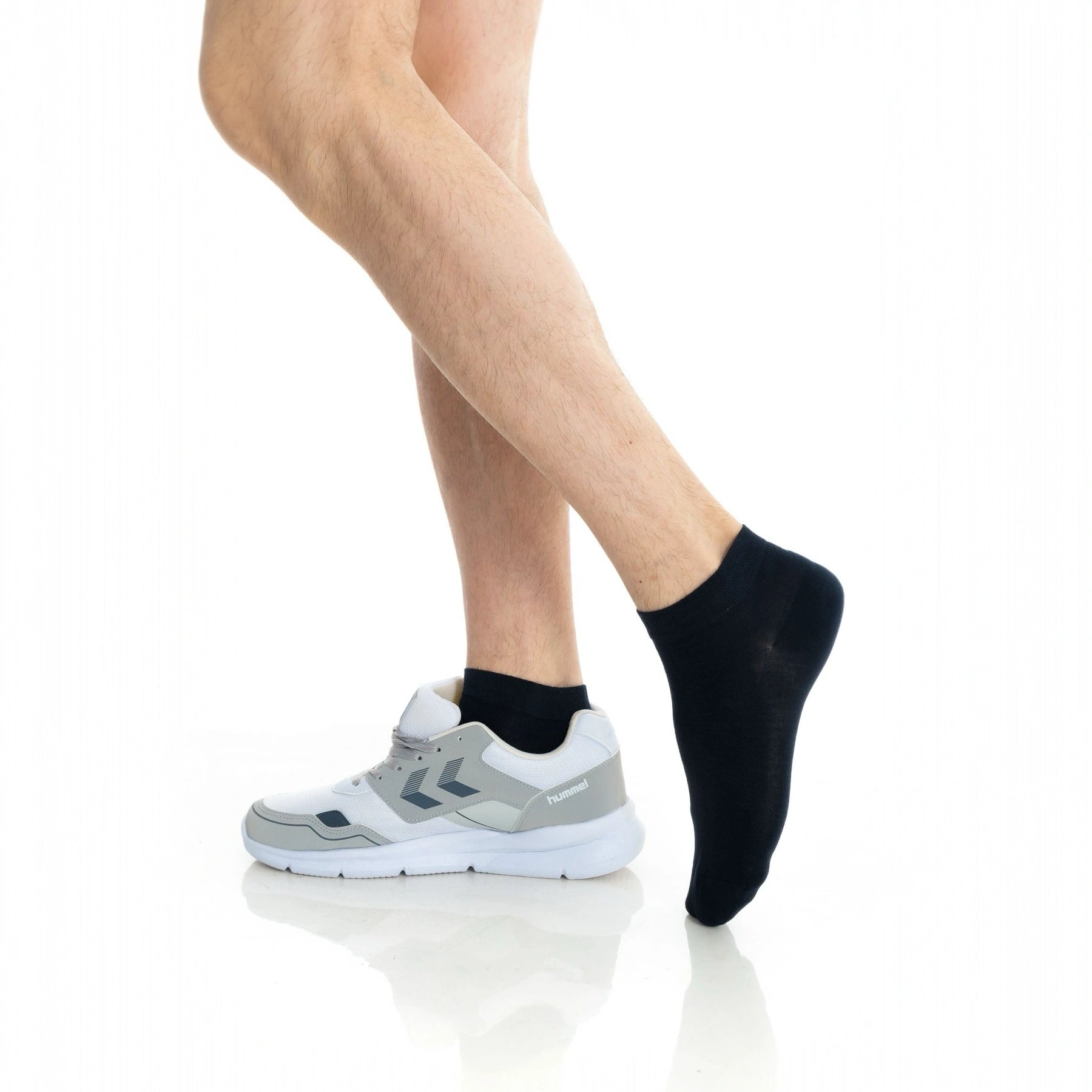 Image of person wearing black bamboo ankle socks