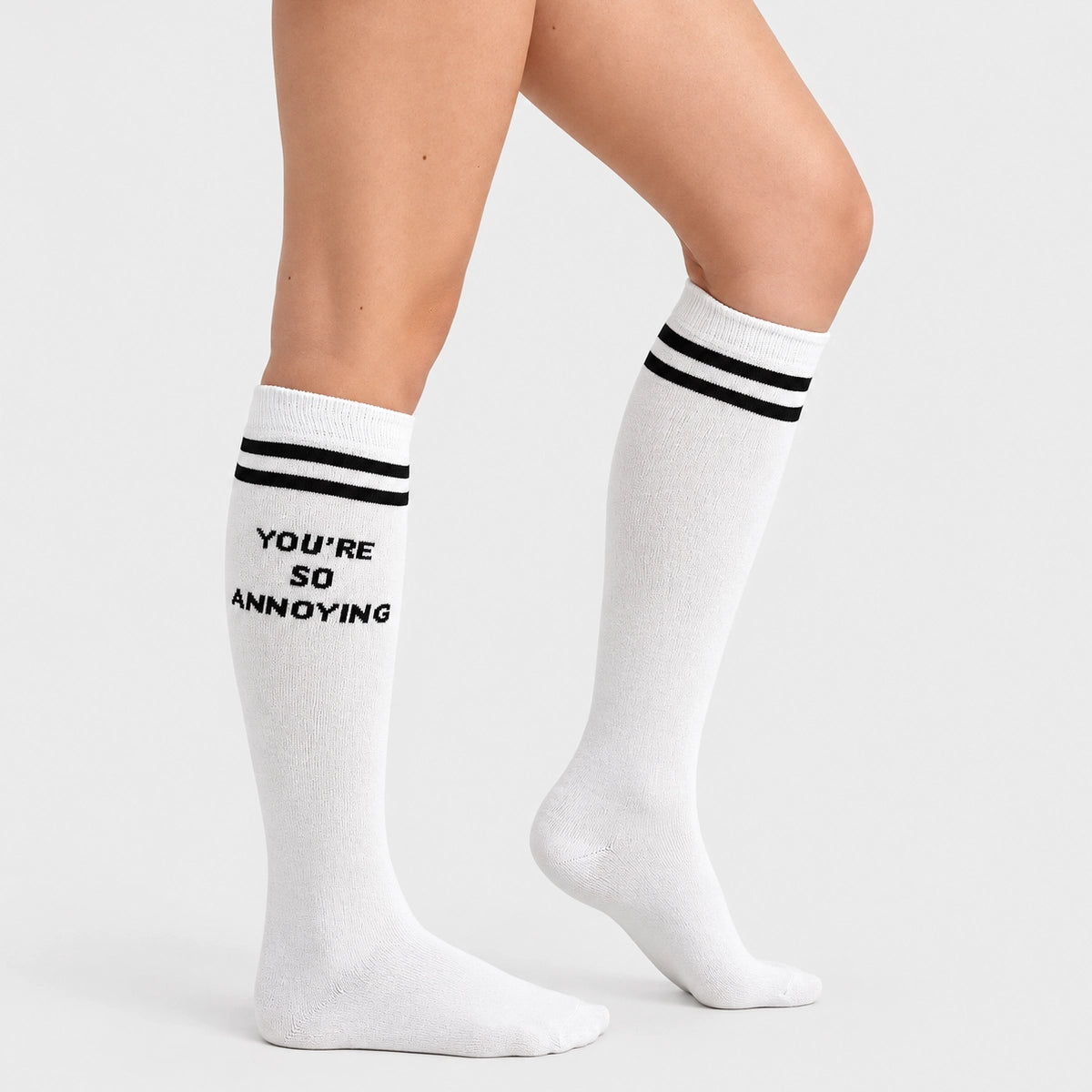 image of woman wearing knee high white sock with slogan you are so annoying