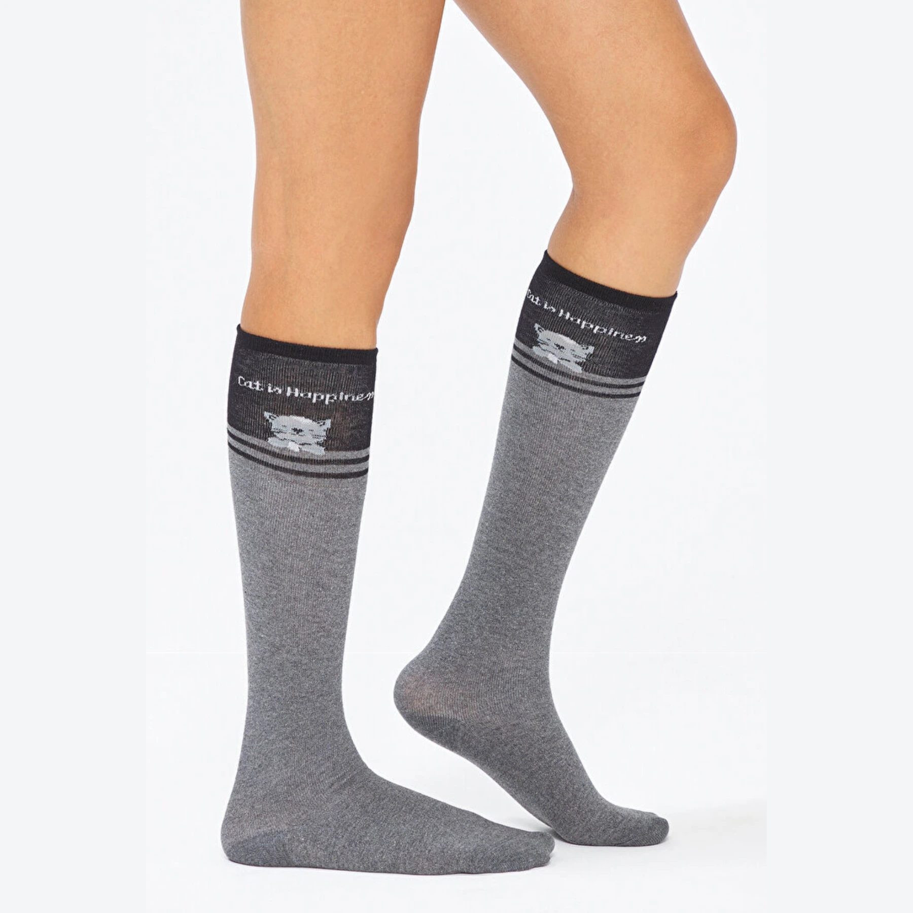 A pair of grey knee high socks with a cat design.