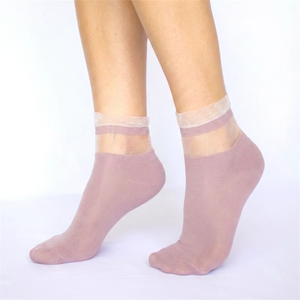 Rose socks with sheer mesh cuff worn by a person on a white background