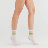 person wearing sheer white crew socks with striped cuff