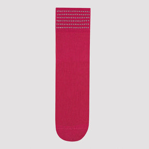 Product shot of  bright pink quarter length sock cuffed with six rows of shiny dots